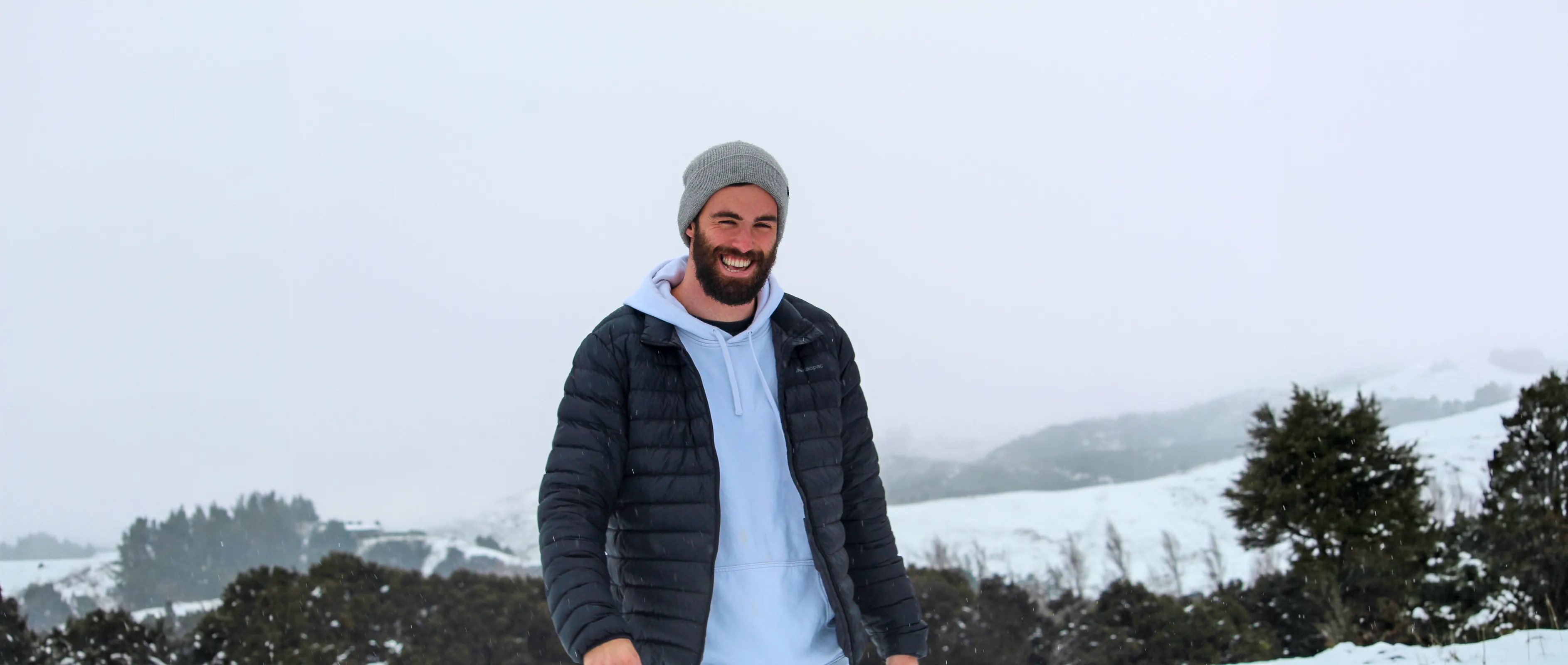 Finn Simpson outdoors in the snow above Kaikōura